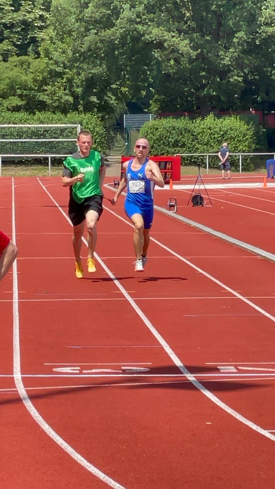 Running in lock step with Simon a few steps before the finish.